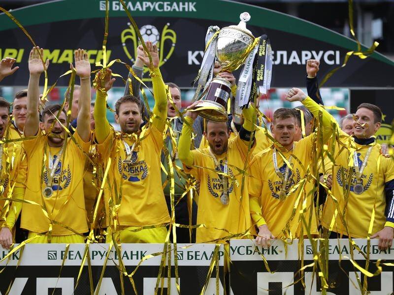 BATE players hold the trophy after winning the Belarusian Cup final in Minsk