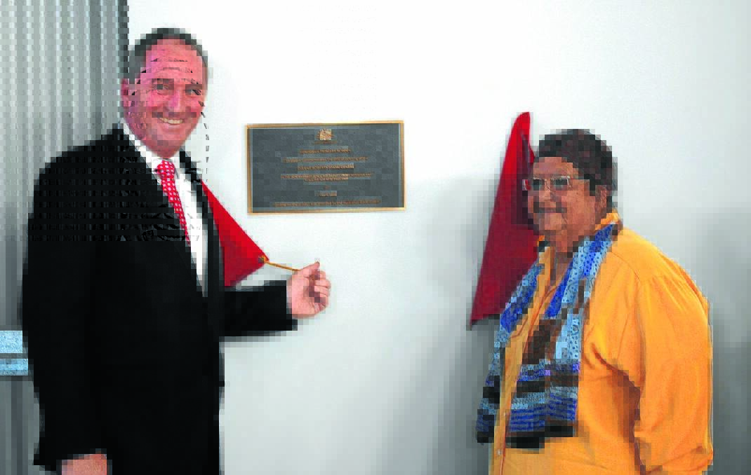 Barnaby Joyce MP and Dianne Roberts OAM unveil the plaque at Minimbah Primary School's new gym which was named in her honour in 2016. File photo.
