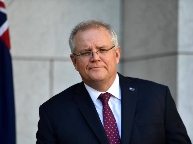 PM Scott Morrison says he will stay at the helm of the COVID-19 crisis as he enjoys a family break.