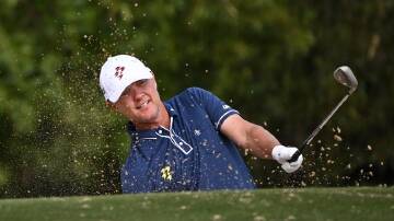 Matt Jones, hitting out of a bunker at the Grange, is three shots off the lead at LIV Adelaide. (Michael Errey/AAP PHOTOS)