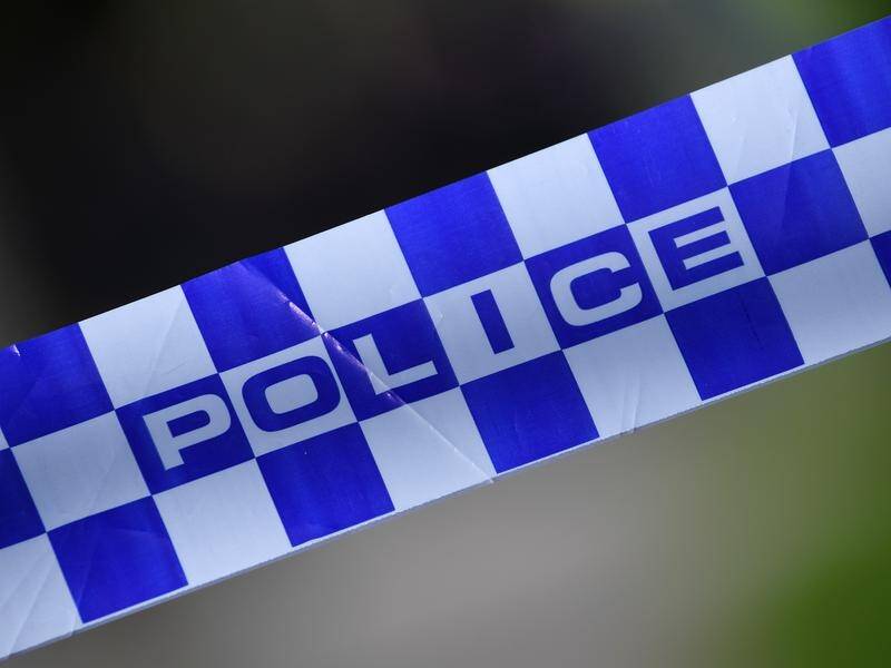 A man is in police custody after the discovery of a young woman's body in Tasmania.