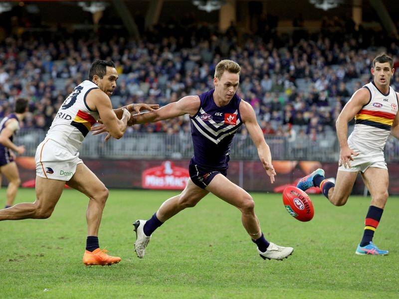 Fremantle's Ryan Nyhuis (centre) will fron the AFL tribunal on Tuesday night.