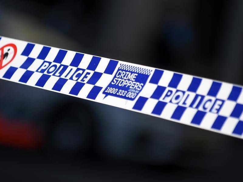 NSW police are investigating two separate stabbing deaths, in Sydney and the state's west. (Steven Saphore/AAP PHOTOS)