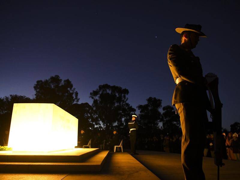 The "wounds and scars of war, seen and unseen" have been acknowledged at Canberra's dawn service.