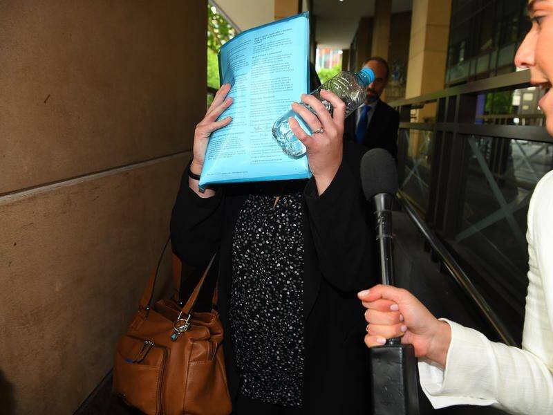 A woman who left her toddler in a hot car has appeared in Melbourne Magistrates Court.