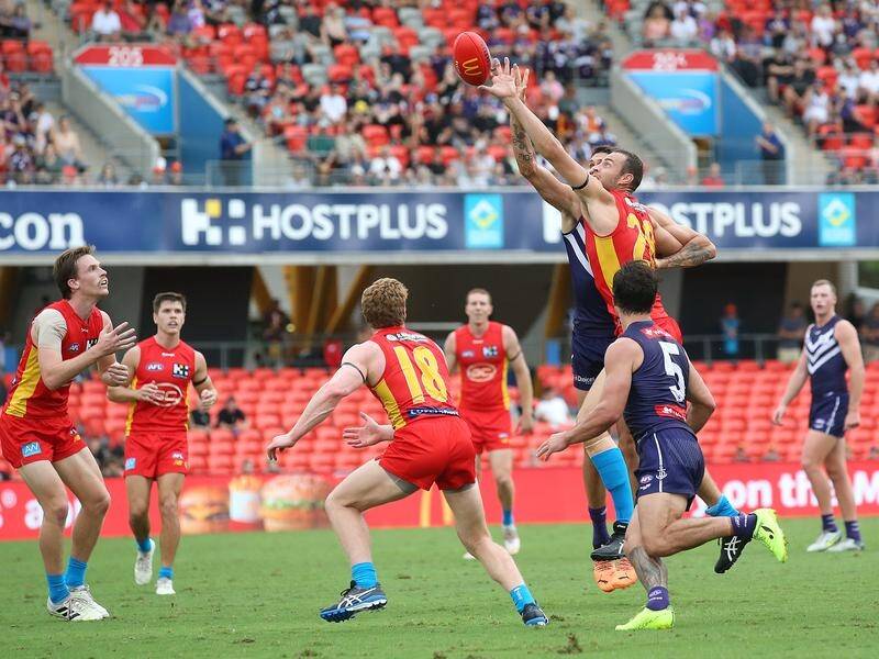 Gold Coast are on the cusp of the AFL top eight after a 36-point win over high-flying Fremantle.