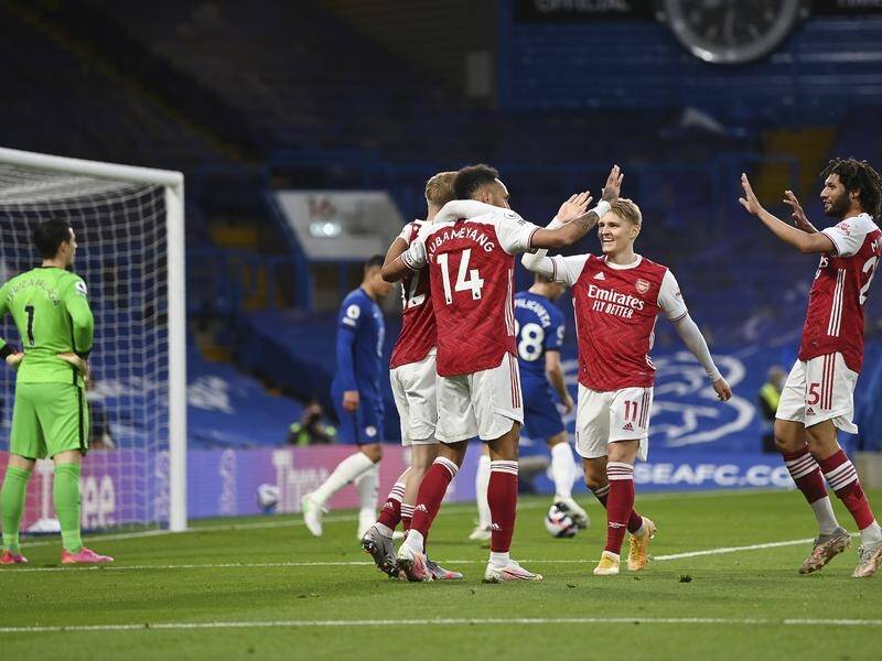Arsenal celebrate Emile Smith Rowe's winning goal in their Premier League game at Chelsea.