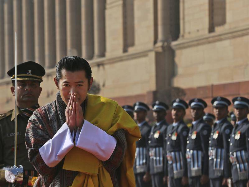 Bhutan's King has been traversing his mountainous nation to support the fight against COVID-19.