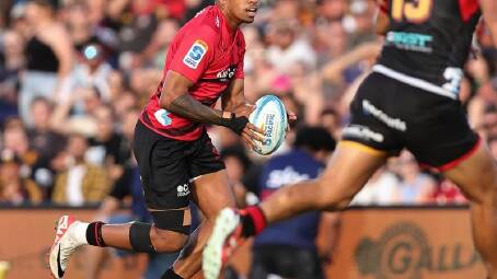 A stunning Chay Fihaki try has set the Crusaders on their way to a first win of the season. (Aaron Gillions/AAP PHOTOS)