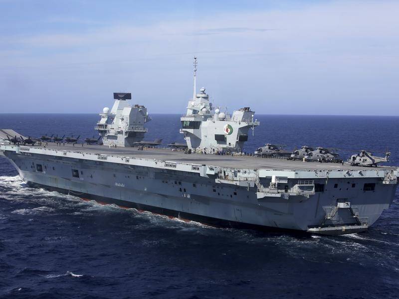 HMS Queen Elizabeth is leading a carrier strike group through the South China Sea.