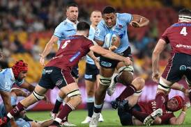 Miles Amatosero (c) has seen enough to believe the Waratahs are about to put together a winning run. (Darren England/AAP PHOTOS)