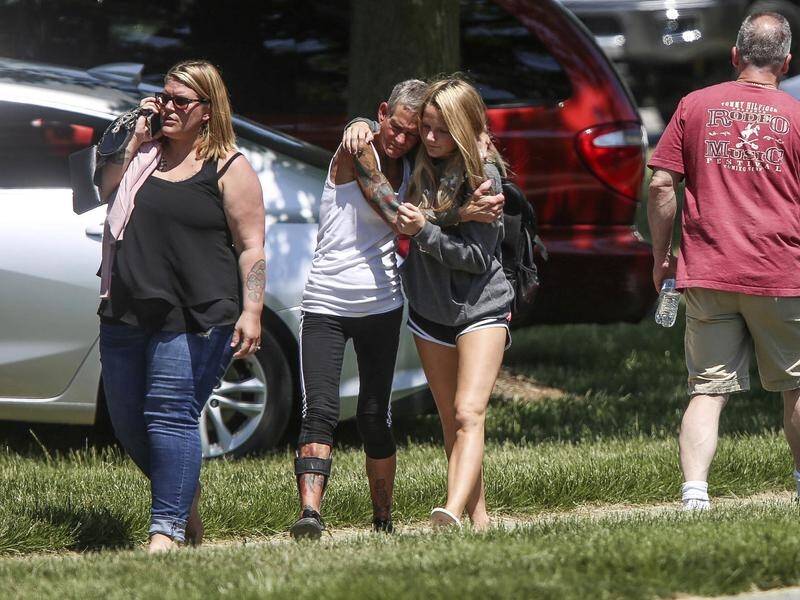 Pupils leave the scene of another school shooting in the US that's left two people injured.