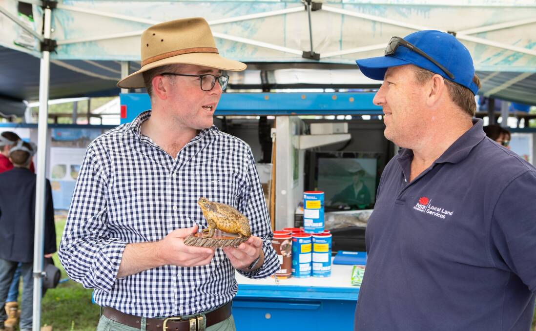 WATCH AND ACT: Minister for Agriculture Adam Marshall discussed cane toads with Northern Tablelands Local Lands Services lands officer Andrew Walsh at the Glen Innes Show.