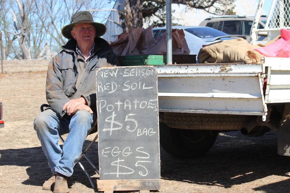 NEW SEASON: Guyra's John Mitchell was selling red soil potatoes and eggs at Sunday's markets.