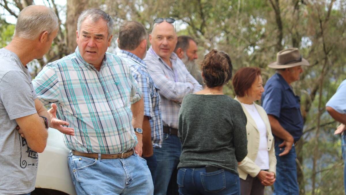 FUNDING: Armidale Mayor Simon Murray and various council members met with Lower Creek residents in early-March when funding for the roadworks was announced.