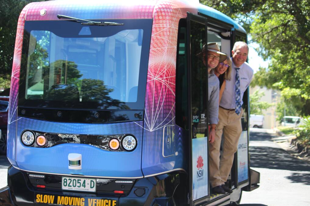 THE TOASTER: The driverless shuttle took the Member for Northern Tablelands Adam Marshall, Cr Libby Martin and mayor Simon Murray for a short ride at monday morning's launch in UNE.