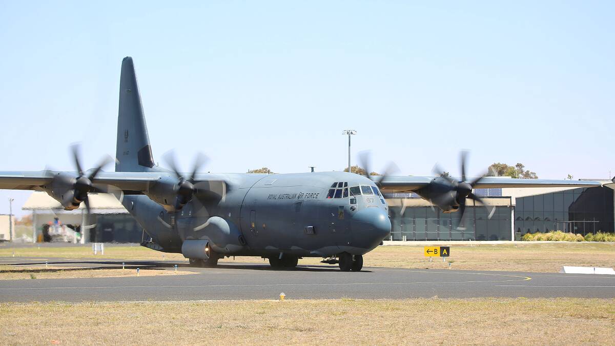 BIG: An RAAF Hercules transport would possibly have been more comfortable with some more room on the tarmac of the Armidale Regional Airport.