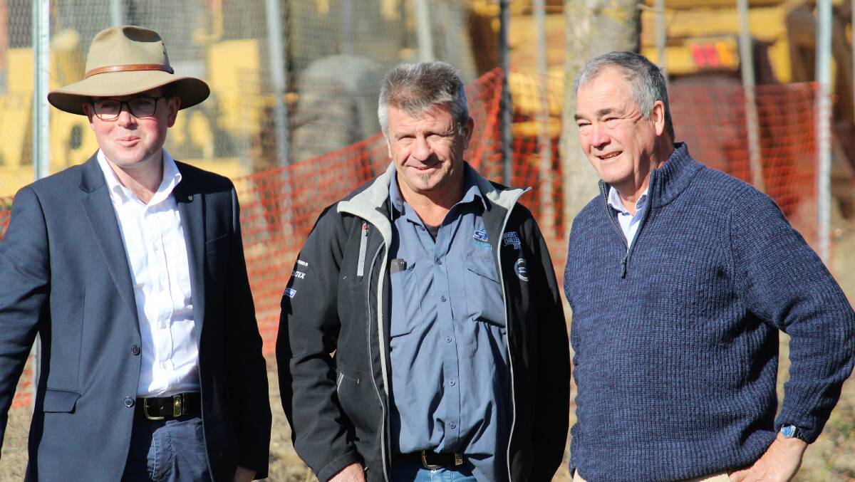 LOADING: Member for Northern Tablelands Adam Marshall with Scott Harvey from SRH Milk Haulage and Armidale Mayor Simon Murray watched Monday's earliest load head off to Guyra.
