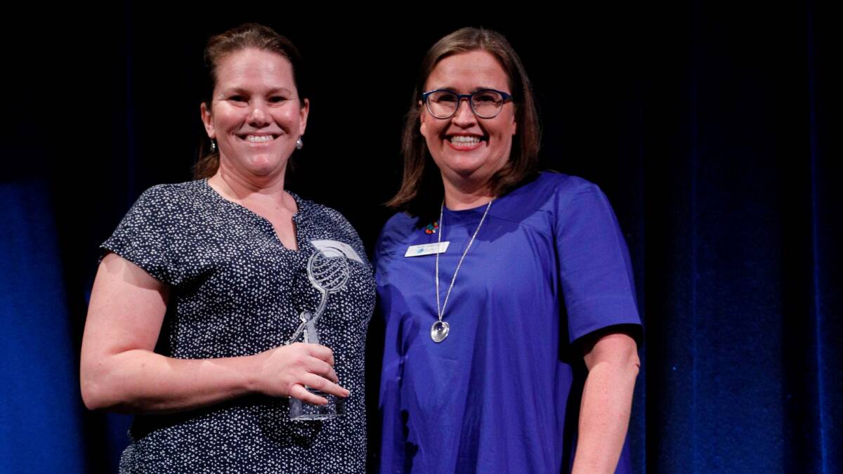 RECOGNISED: Armidale Regional Council representative Aimee Hutton (left) receives the award from the Australian Human Rights Commissions Sex Discrimination Commissioner, Kate Jenkins.