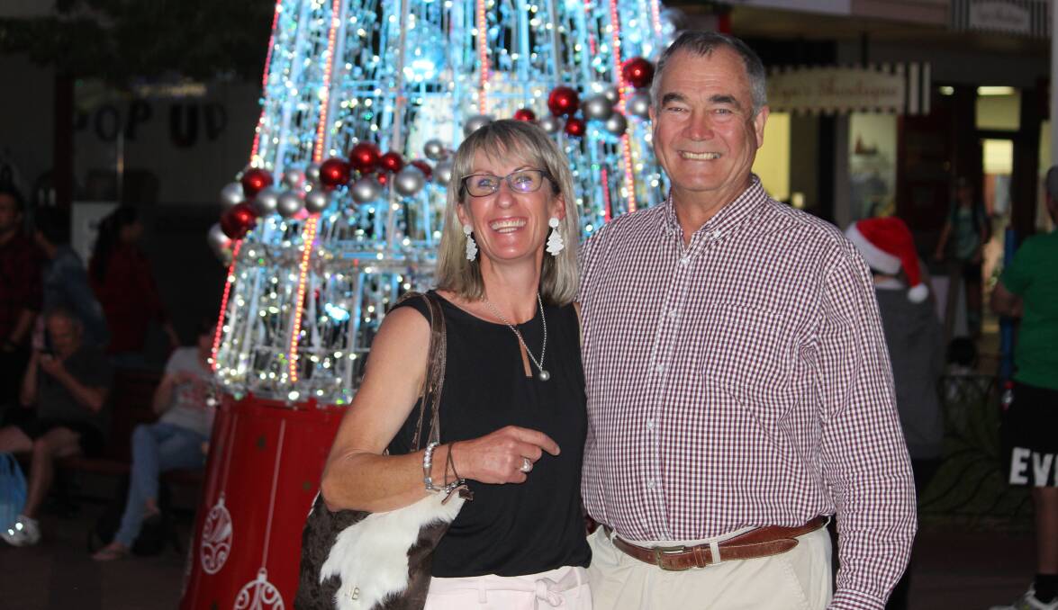 LIT UP: Deputy Mayor Libby Martin with Mayor Simon Murray in front of Armidale's Christmas tree. Cr Martin lit the tree this year and said the big crowd was great. 
