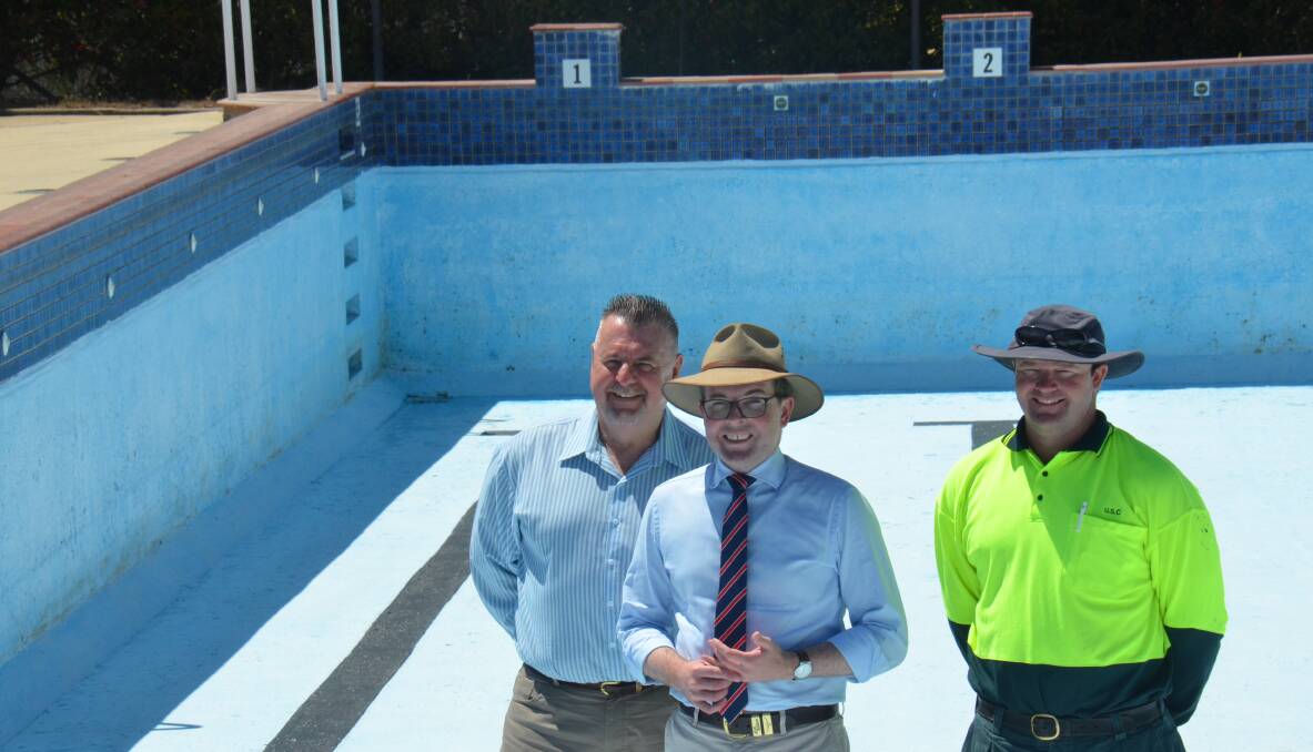 Uralla Mayor Michael Pearce, Member for Northern Tablelands Adam Marshall and pool manager Martin Williams.