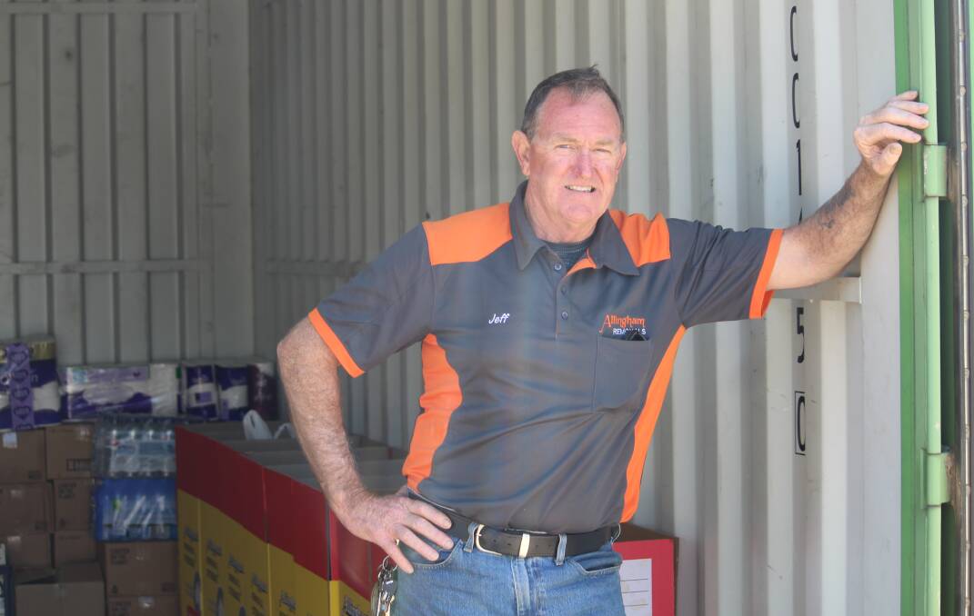 DONATIONS: Allingham's Removals and Storage's Jeff Cameron inside the container they hope to fill with useful items for the fire fighters and evacuees at Ebor.