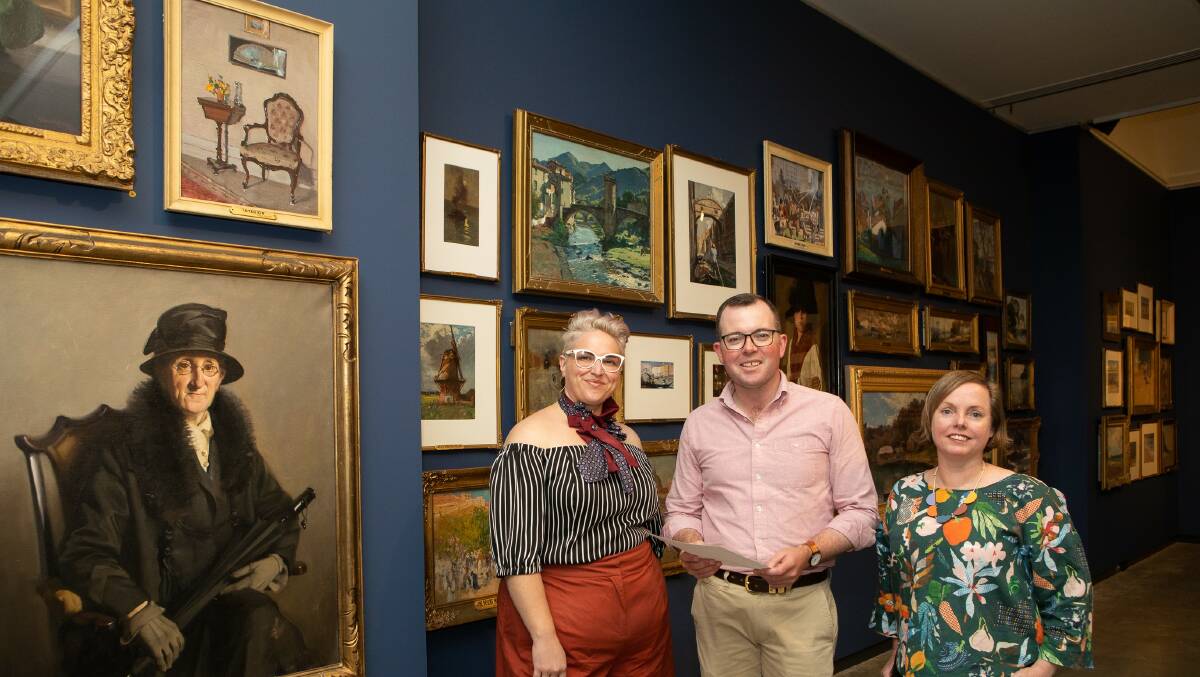 FUNDING: NERAM Director Rachael Parsons with Northern Tablelands MP Adam Marshall and manager, Exhibitions & Curatorial Belinda Hungerford in front of the Hinton Collection.