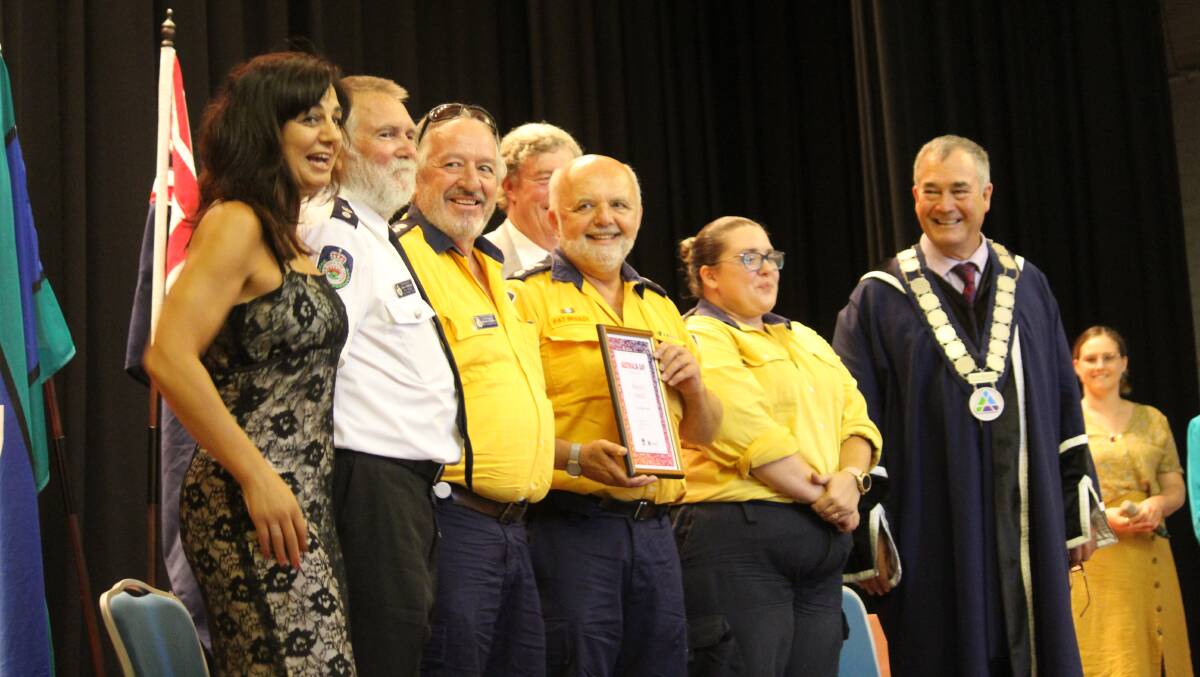 RECOGNITION: On stage and Australia Day Ambassador Liz Deep-Jones encouraged the applause for the RFS representatives.