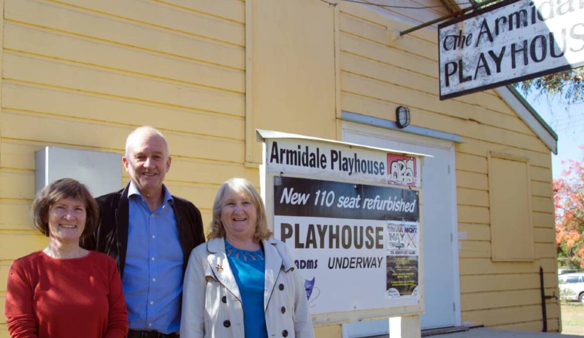 NOW CAUTIOUS: committee members Carolyn Shepherd, Bruce Menzies and Marney Tilley outside the playhouse in happier days.