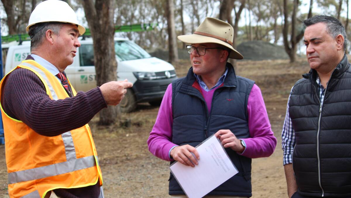 INFORMATION: Mayor Simon Murray explains what is needed when Minister for Agriculture Aam Marshall and deputy Premier John Barilaro visited Malpas Dam in June.