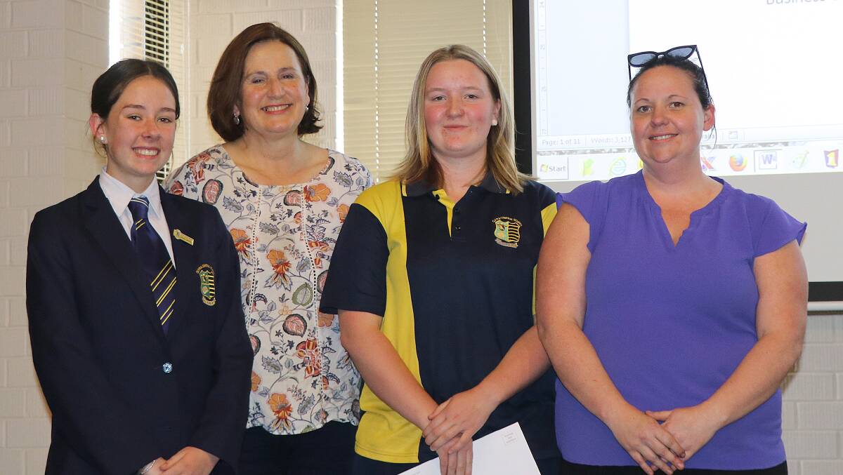 Guyra Central School student Bronte Stanley, Councillor Margaret O’Connor, student Colleen Pearson and art teacher Clea Townsend during the presentation at last week’s Armidale Regional Council meeting.