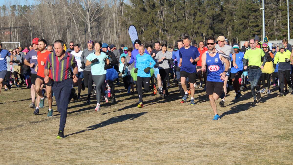 THEY'RE OFF: Starters in the Armidale run for Parkrun's fifth birthday set off around the course on Saturday morning. 