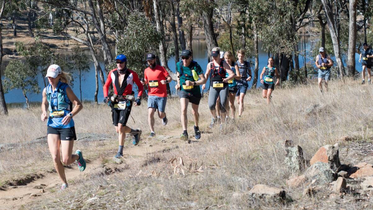 SCENIC: Runners in last year's event on a trail near Dumaresq Dam.