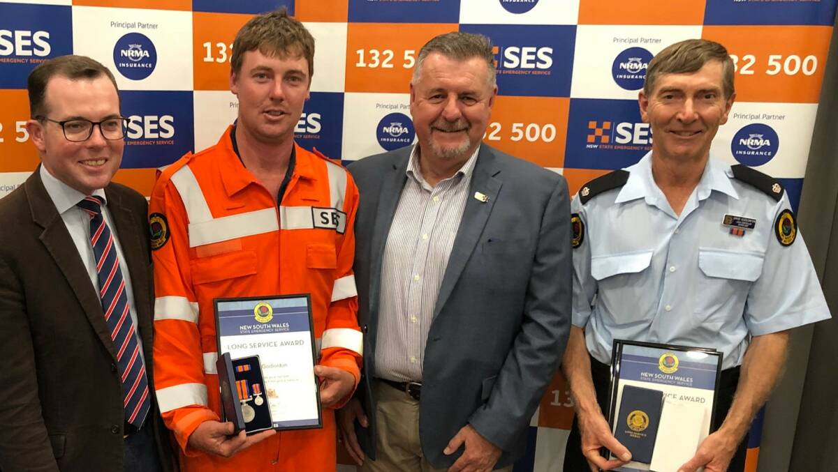 PRESENTATIONS: Member for Northern Tablelands Adam Marshall, Guyra’s Glen Godlonton who was recognised for a decade of service with Uralla Mayor Michael Pearce and Guyra SES Unit controller David Godlonton.