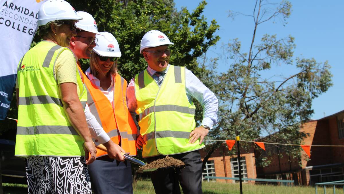 SHOVELLING: Project liaison officer Kris Croft watched Local MP Adam Marshall turn the ceremonial first sod for the Armidale Secondary College with principal Carolyn Lasker and educational leadership director Pat Cavanagh.