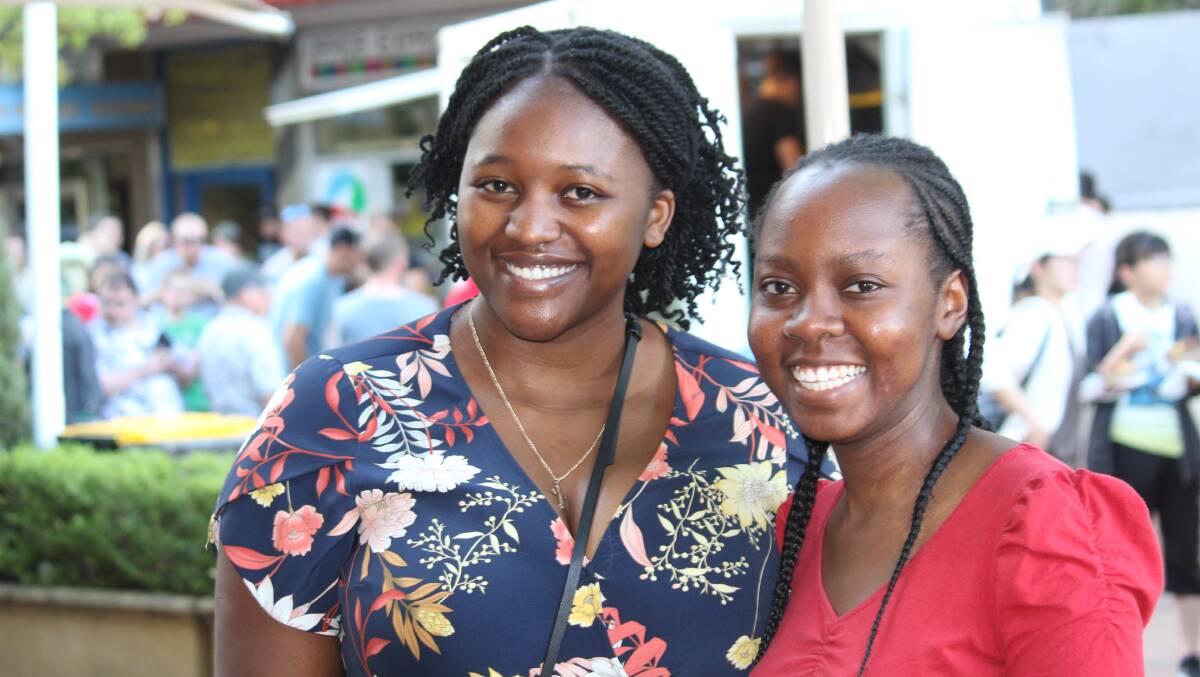 CURIOUS: Audrey Maweni and Mazvita Mataranyika are hospital workers in Armidale who decided to check out the twilight markets in Beardy Street Mall. Photo by: STEVE GREEN