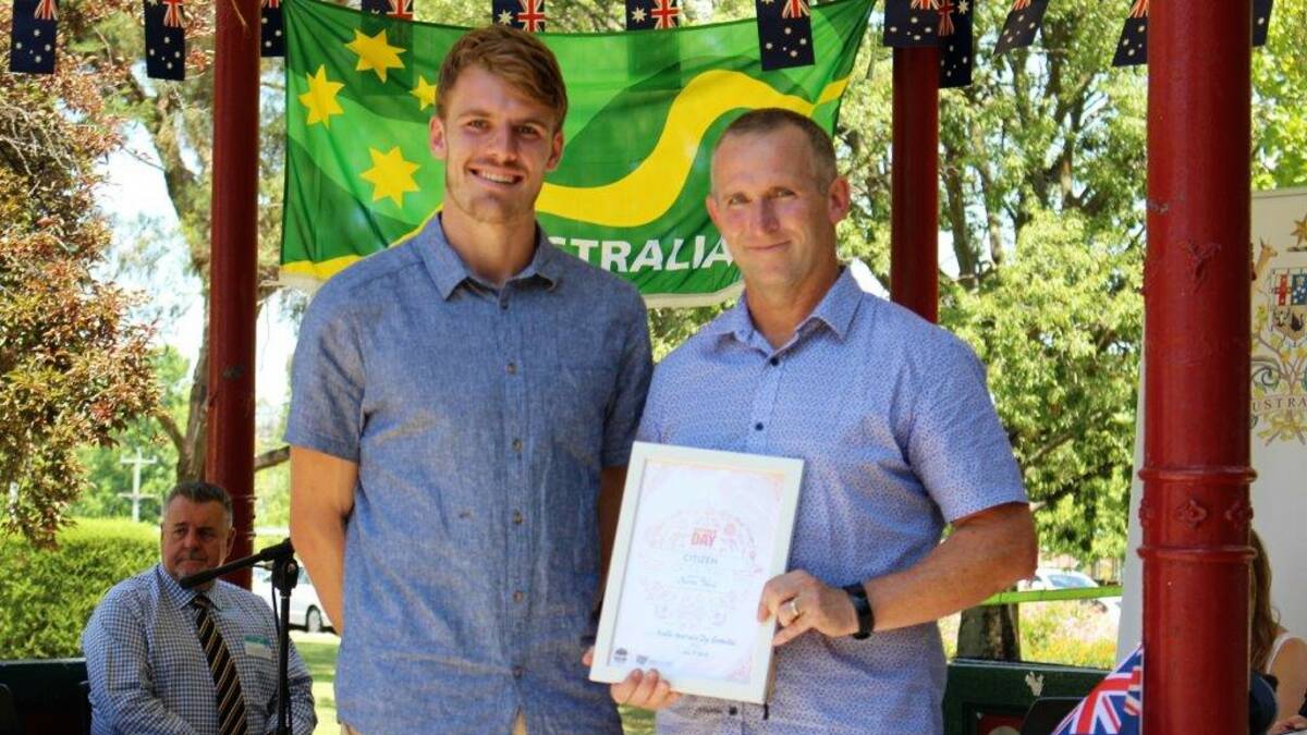 PRESENTATION: Uralla Australia Day Ambassador Bryce Collins with Andrew Ward, who collected the Citizen Of the Year Award on behalf of his father, Kevin Ward.