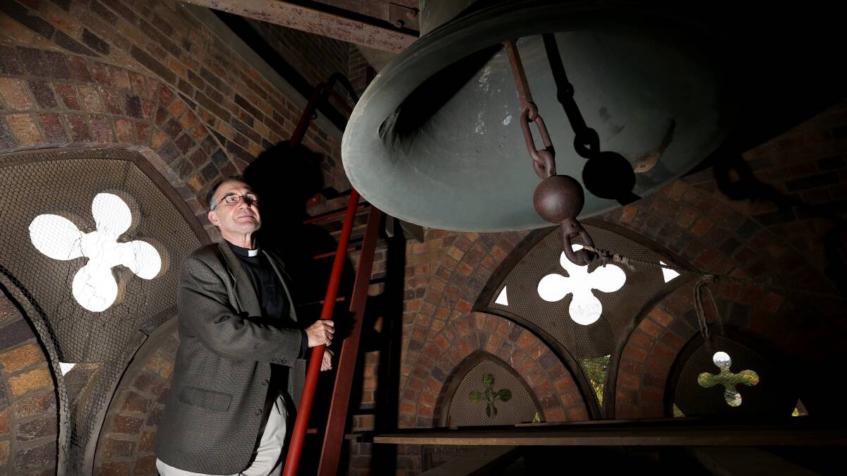SPECIAL TIME FOR MANY: Stephen Williams, dean of St Peter’s Anglican Cathedral, heralds in Easter in the church tower. Photo MATT BEDFORD
