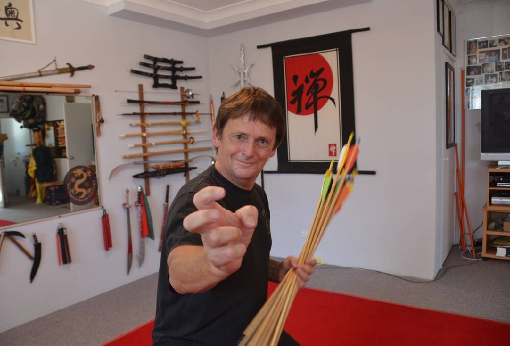 FASTEST HANDS IN THE WEST: Anthony Kelly world renowned arrow catching skills earned him a spot on Chinese television. 