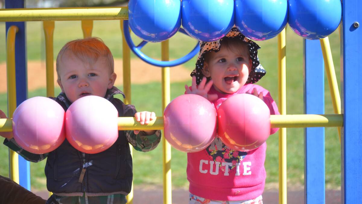 PLAYTIME: Oliver Emery and Faith Fittler were loving the sunny weather. 