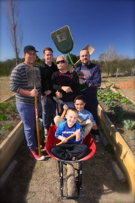 PLOT: From left, Bailey Widders, Josh McCormick, Steve Widders Anthony Westaway, with Dion Whitfield and Braith Westaway in the wheelbarrow.