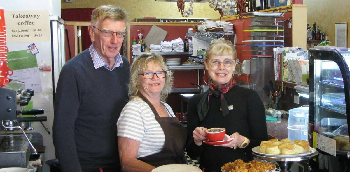 Sunny days: Ross and Kim Burnet, with Sandra Eady from Z-Net, at Cafe Gusto which will soon be solar powered.