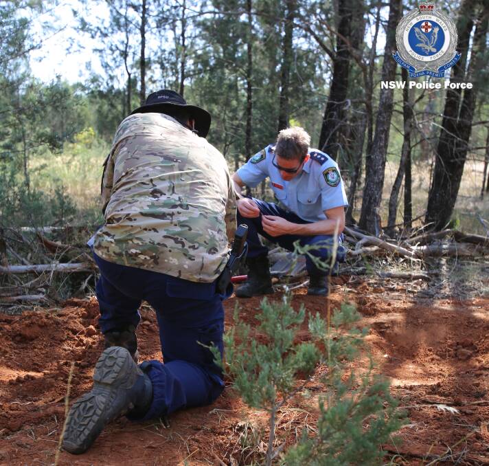 Adrian Telfer assists with the search of Lester State Forest. Picture: NSW Police Force