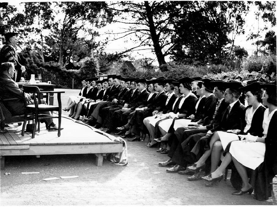 New England University College matriculation ceremony 1939. Behind the work creating a new university lay the families of the academics.
