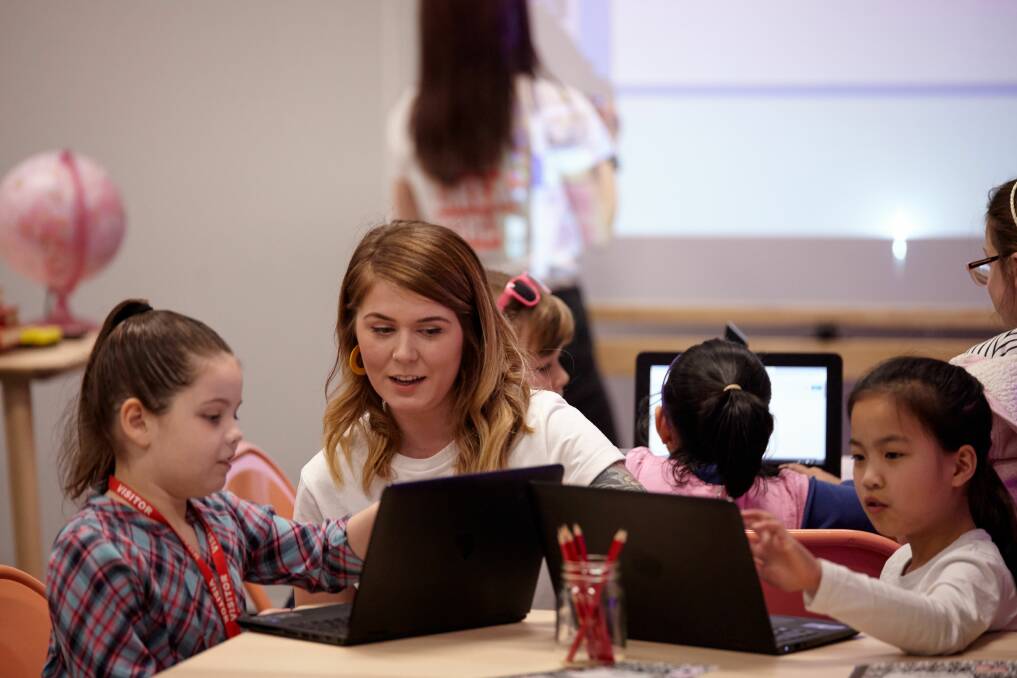 Code Like a Girl founder Ally Watson teaching at one of the coding workshops.