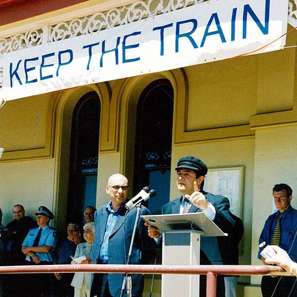 RALLY TO KEEP TRAIN: Richard Torbay and former Minister for Transport Michael Costa at the 3000-strong public rally to save the rail service to Armidale, October 2003.