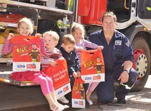 Rose Chetwynd, Cahill McIntyre, Rocco Chetwynd and Eloise Chetwynd with local fire fighter Alex Kiriczenko.