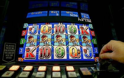 Political gamble...Labor MPs threaten to vote in caucus against pokies deal.