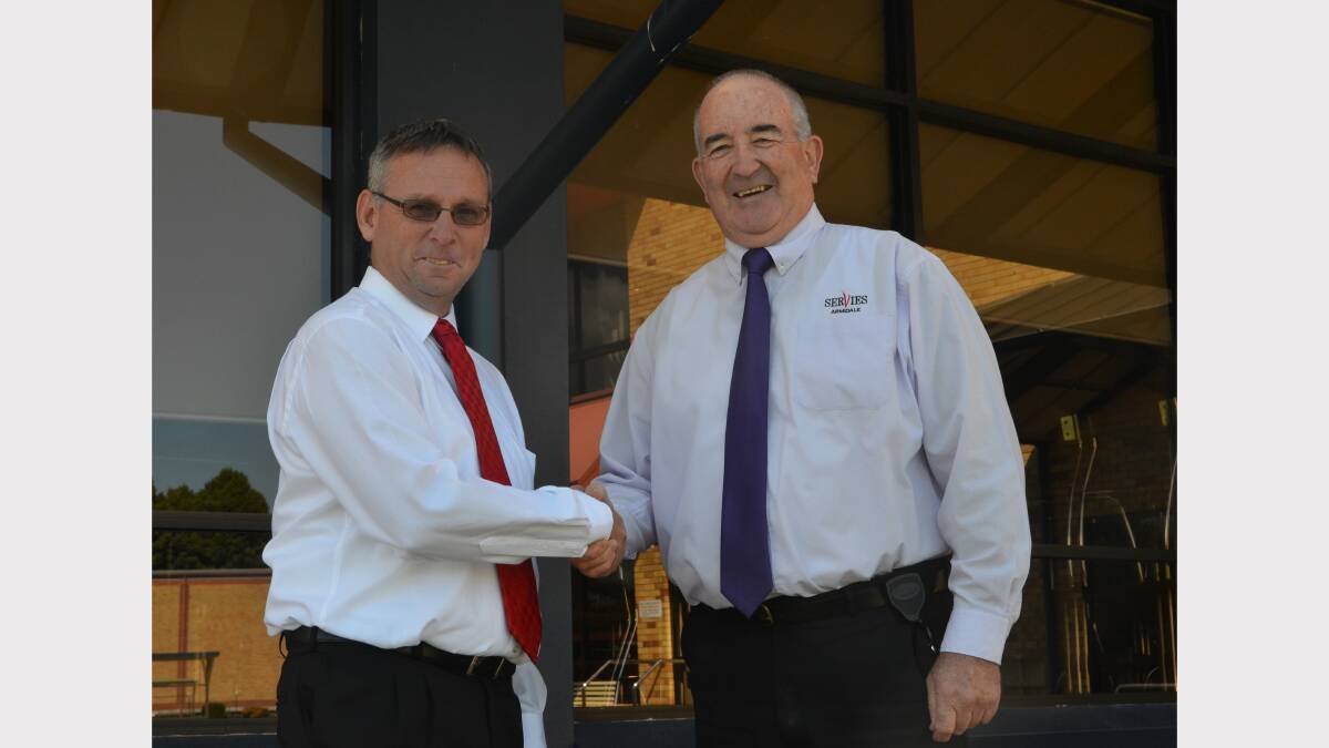 CHANGE OF GUARD: Armidale Ex-Services Club’s new chief executive Scott Sullivan is working on the motel development plan with retired CEO Bob Ryan.