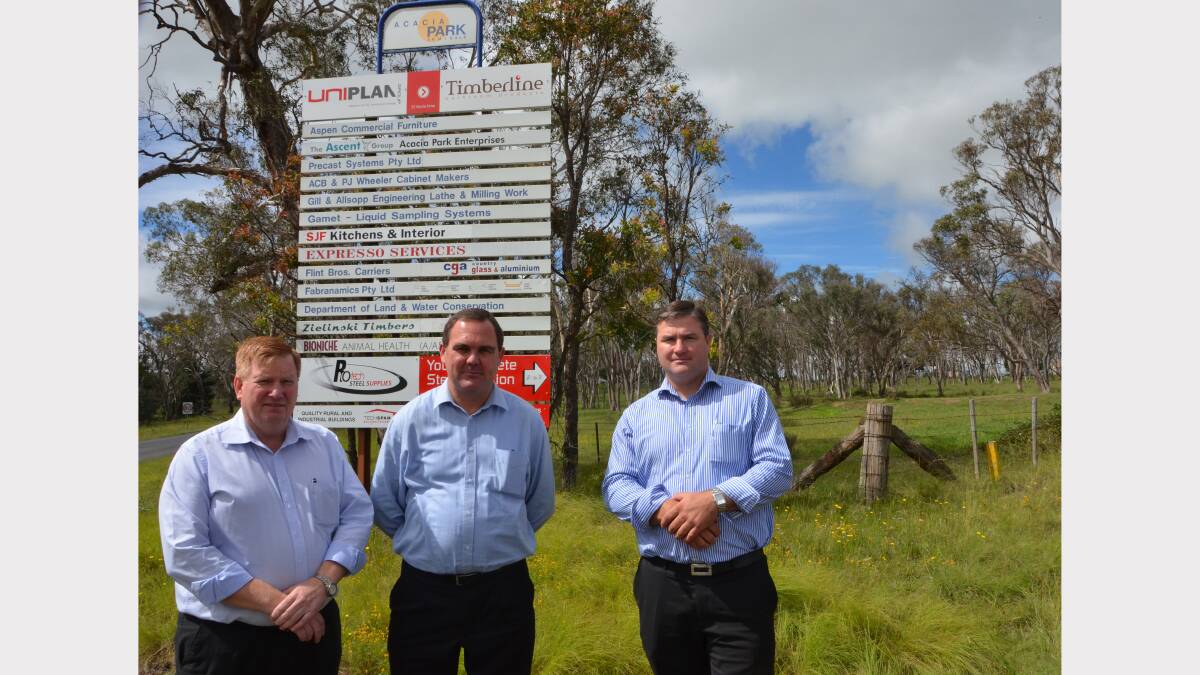 NOT  IMPRESSED: Acacia Park businessmen Howard Scott, Steve Heaney and Tim Ovenden say they shouldn’t have to pay to access the NBN fibre network.